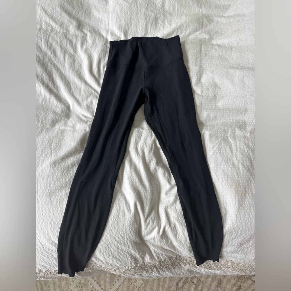 Size 6 Lululemon align leggings black full length - one small hole by knee